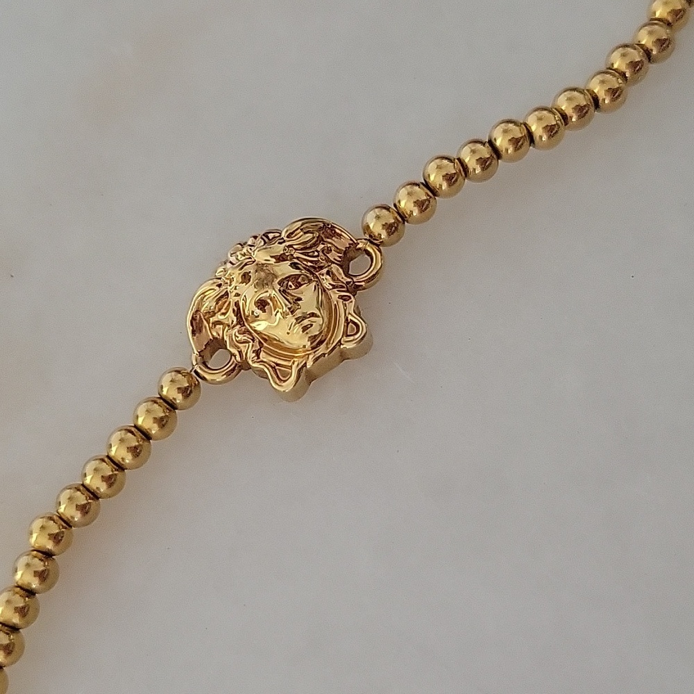 Versace bracelet authentic medusa head in gold please read description